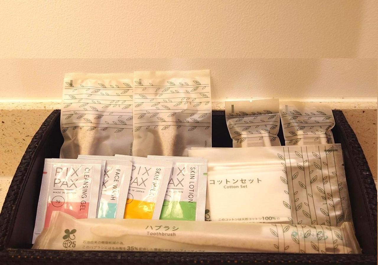 Hotel Monterey Okinawa Spa & Resort Onna Luaran gambar A selection of toiletries in a hotel bathroom
