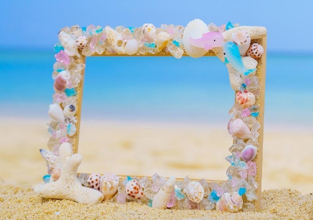 Hotel Monterey Okinawa Spa & Resort Onna Luaran gambar A seashell frame